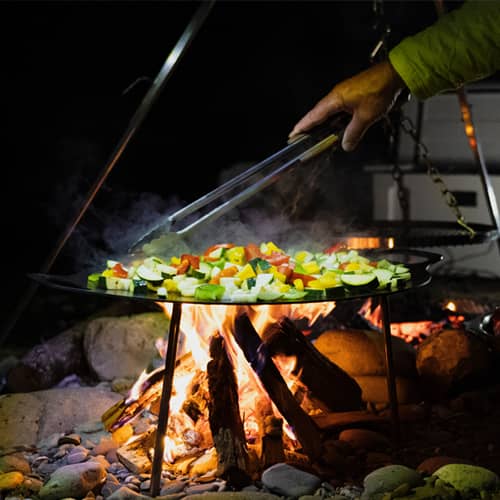 Delicious barbecue around the campfire